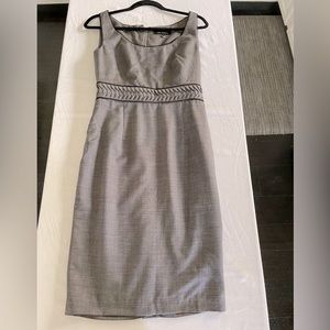 Pink Tartan form fitting gray zip sleeveless dress.
